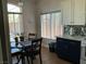 Eat-in kitchen area with natural light, stainless steel appliances, and modern cabinets at 9753 Arrowcrest Ave, Las Vegas, NV 89147