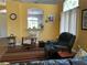 Comfortable living room featuring a ceiling fan, recliner, and vaulted ceilings for a spacious feel at 9753 Arrowcrest Ave, Las Vegas, NV 89147