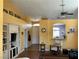 Bright living room with wood floors, comfortable seating, and arched windows for natural light at 9753 Arrowcrest Ave, Las Vegas, NV 89147