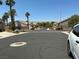 Quiet streetscape with well-maintained landscaping and attractive homes in a serene neighborhood at 9753 Arrowcrest Ave, Las Vegas, NV 89147