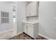 Dining room with white cabinets at 977 Edinburgh Fields Ct, Las Vegas, NV 89138