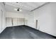 Clean garage featuring abundant storage space, and bright overhead lighting at 977 Edinburgh Fields Ct, Las Vegas, NV 89138