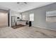 Bright living room featuring a modern kitchen and ample natural light at 977 Edinburgh Fields Ct, Las Vegas, NV 89138