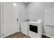 Well-lit laundry room with modern appliances at 977 Edinburgh Fields Ct, Las Vegas, NV 89138