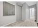 Neutral-toned room with a window and light-colored carpet and trim at 977 Edinburgh Fields Ct, Las Vegas, NV 89138
