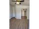A large bedroom shows vinyl floors, neutral paint, and ceiling fan at , Henderson, NV 89002