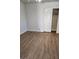 The bedroom features vinyl floors, fresh paint, and double doors to the closet at , Henderson, NV 89002