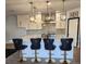 Modern kitchen boasting a large island with seating and upgraded stainless steel appliances at , Henderson, NV 89002