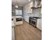 Bright kitchen features stainless steel appliances, ample cabinet space, and hardwood flooring at , Henderson, NV 89002