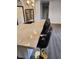 Modern kitchen featuring a marble countertop island and black leather bar stools at , Henderson, NV 89002
