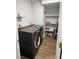Laundry room with LG washer and dryer, shelving, and storage space at , Henderson, NV 89002
