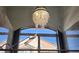 Bathroom featuring a chandelier, dual shower heads, and an arched window at , Henderson, NV 89002