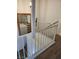 View of the staircase with a decorative mirror on the wall at , Henderson, NV 89002