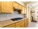 Kitchen features sleek appliances, granite countertops, and a modern backsplash at 10125 Hope Island Dr, Las Vegas, NV 89134