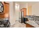 Well-equipped kitchen with stainless steel appliances, granite countertops, and ample cabinet space at 10147 Aspen Rose St # 101, Las Vegas, NV 89183