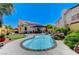 Refreshing backyard featuring a pool, landscaping, and a patio area for outdoor relaxation at 1028 Dodger Blue Ave, Las Vegas, NV 89123
