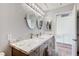Beautiful bathroom featuring double sinks, granite countertops, and ample counter space at 1028 Dodger Blue Ave, Las Vegas, NV 89123