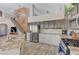 Contemporary kitchen featuring stainless steel appliances, granite countertops, and ample cabinet space at 1028 Dodger Blue Ave, Las Vegas, NV 89123