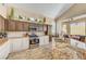 Bright kitchen boasts granite countertops, stainless appliances, and an adjacent breakfast nook at 1028 Dodger Blue Ave, Las Vegas, NV 89123