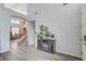 Open entryway with modern flooring, neutral walls, and staircase leading to the second floor, creating a seamless flow at 1028 Dodger Blue Ave, Las Vegas, NV 89123