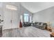 Bright living room boasts large windows, neutral decor, and comfortable seating arrangements at 1028 Dodger Blue Ave, Las Vegas, NV 89123