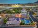 Wide aerial view showcasing neighborhood with desert landscape and mountain views at 10319 Larkmead Ave, Las Vegas, NV 89149