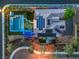 Overhead aerial view showcasing a private backyard oasis complete with pool and putting green at 10319 Larkmead Ave, Las Vegas, NV 89149
