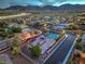 Expansive aerial neighborhood view showcasing mountain views at 10319 Larkmead Ave, Las Vegas, NV 89149