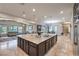 Bright, open kitchen with granite counters, stainless steel appliances, and seamless flow to living spaces at 10319 Larkmead Ave, Las Vegas, NV 89149