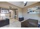 Office space showcasing a desk, cabinets, and views into the foyer at 10319 Larkmead Ave, Las Vegas, NV 89149