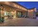 Spacious covered patio with ceiling fans, ample seating, and views of the landscaped backyard at 10319 Larkmead Ave, Las Vegas, NV 89149