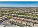 Aerial view of residential neighborhood and mountain range at 10353 Yew Blossom Ave, Las Vegas, NV 89166