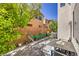 Private backyard oasis includes a hammock and patio furniture perfect for relaxing at 10353 Yew Blossom Ave, Las Vegas, NV 89166
