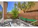 Relaxing backyard with hammock, patio table and mature trees at 10353 Yew Blossom Ave, Las Vegas, NV 89166