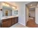 Bright bathroom features double sinks, spacious vanity, and large mirror providing plenty of light at 10353 Yew Blossom Ave, Las Vegas, NV 89166
