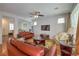 Spacious living room with hardwood floors and a comfortable seating area at 10353 Yew Blossom Ave, Las Vegas, NV 89166