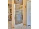 Bathroom showcasing glass enclosed shower with built-in seat at 10361 Profeta Ct, Las Vegas, NV 89135