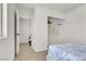 Bedroom features wood floors, a bright, airy feel, and closet space at 10554 Lilac Tree Ave, Las Vegas, NV 89135
