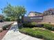 Landscaped entrance with the 'Northdale' community sign, featuring a sidewalk and lush greenery at 10554 Lilac Tree Ave, Las Vegas, NV 89135