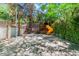 Spacious backyard with a playground and basketball court at 108 Quail Run Rd, Henderson, NV 89014