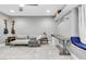 Cozy living room with comfortable seating, a built-in desk, and stylish decor at 108 Quail Run Rd, Henderson, NV 89014