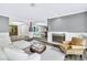 Bright living room with a fireplace, stylish seating, and elegant decor at 108 Quail Run Rd, Henderson, NV 89014