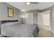 Bedroom boasts a large bed, closet, and neutral décor at 1150 Red Margin Ct # 101, Las Vegas, NV 89183