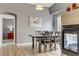 Charming dining room with a fireplace and a view to another room at 1150 Red Margin Ct # 101, Las Vegas, NV 89183