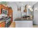 Kitchen features stainless appliances, modern cabinets and finishes at 1150 Red Margin Ct # 101, Las Vegas, NV 89183