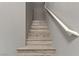 Stairway features wood look plank steps and light neutral paint at 1150 Red Margin Ct # 101, Las Vegas, NV 89183
