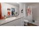 Bathroom showcasing a granite countertop, a bathtub, and a decorative moose at 12348 Golden Wreath Rd # 1, Las Vegas, NV 89183