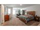 Spacious bedroom featuring ample natural light, comfortable seating, and stylish decor at 12348 Golden Wreath Rd # 1, Las Vegas, NV 89183