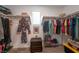 Spacious walk-in closet with ample shelving, hanging space, and a window for natural light at 12348 Golden Wreath Rd # 1, Las Vegas, NV 89183