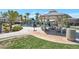 Scenic community park with a playground, gazebo, and lush green grass for recreation at 12348 Golden Wreath Rd # 1, Las Vegas, NV 89183
